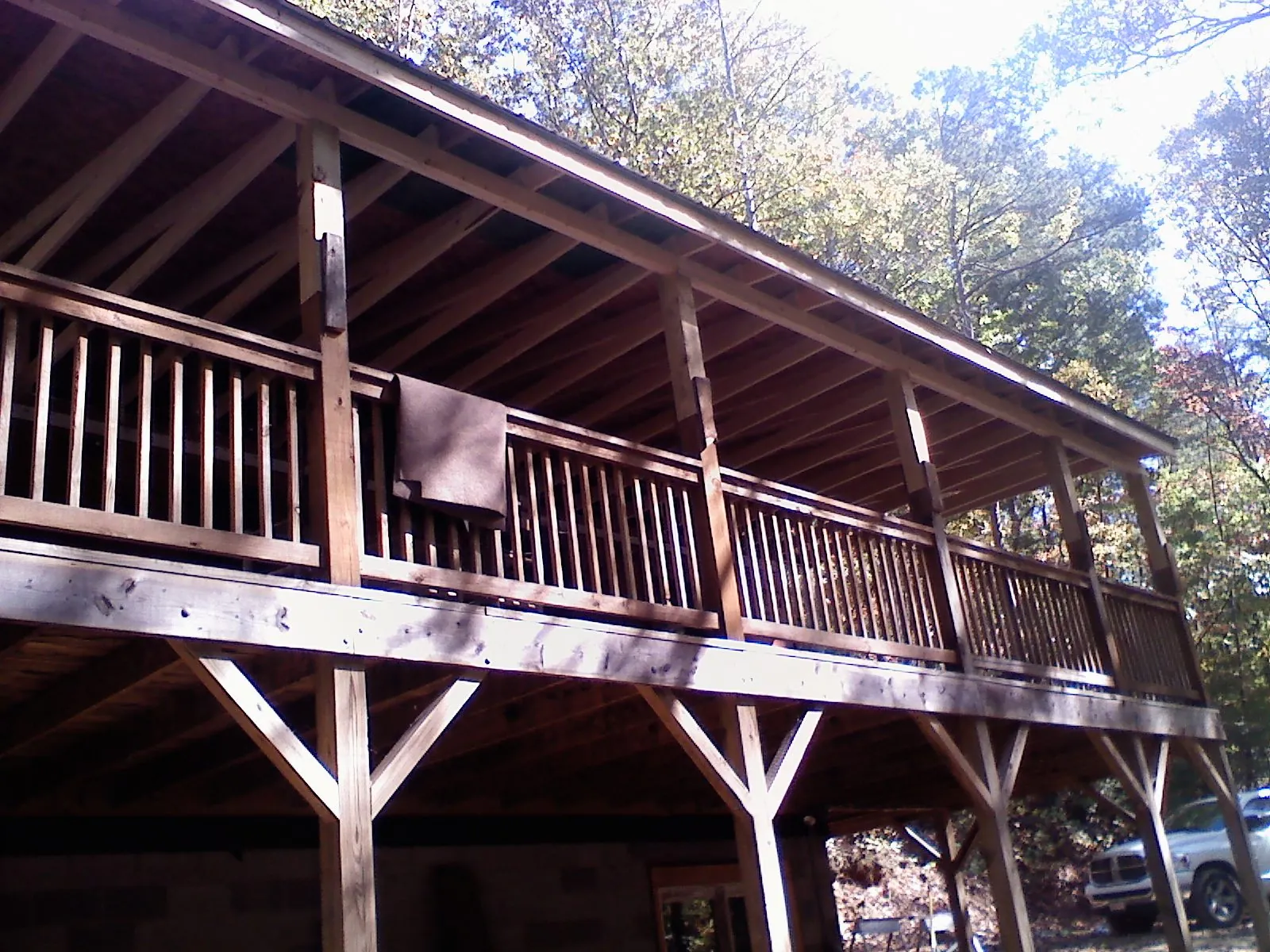 Timber framing under a new elevated porch and deck — Roof Leak Repair in Freeman by Roofing Brothers
